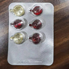 OEM Automatic Surprise Plastic Egg Joy Egg with Toys Chocolate Cream Forming Filling Sealing Blister Packing Machine