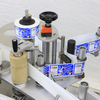 AutomaTIc Adhesive Two Sticker Flat Round Bottle Labeling Machine